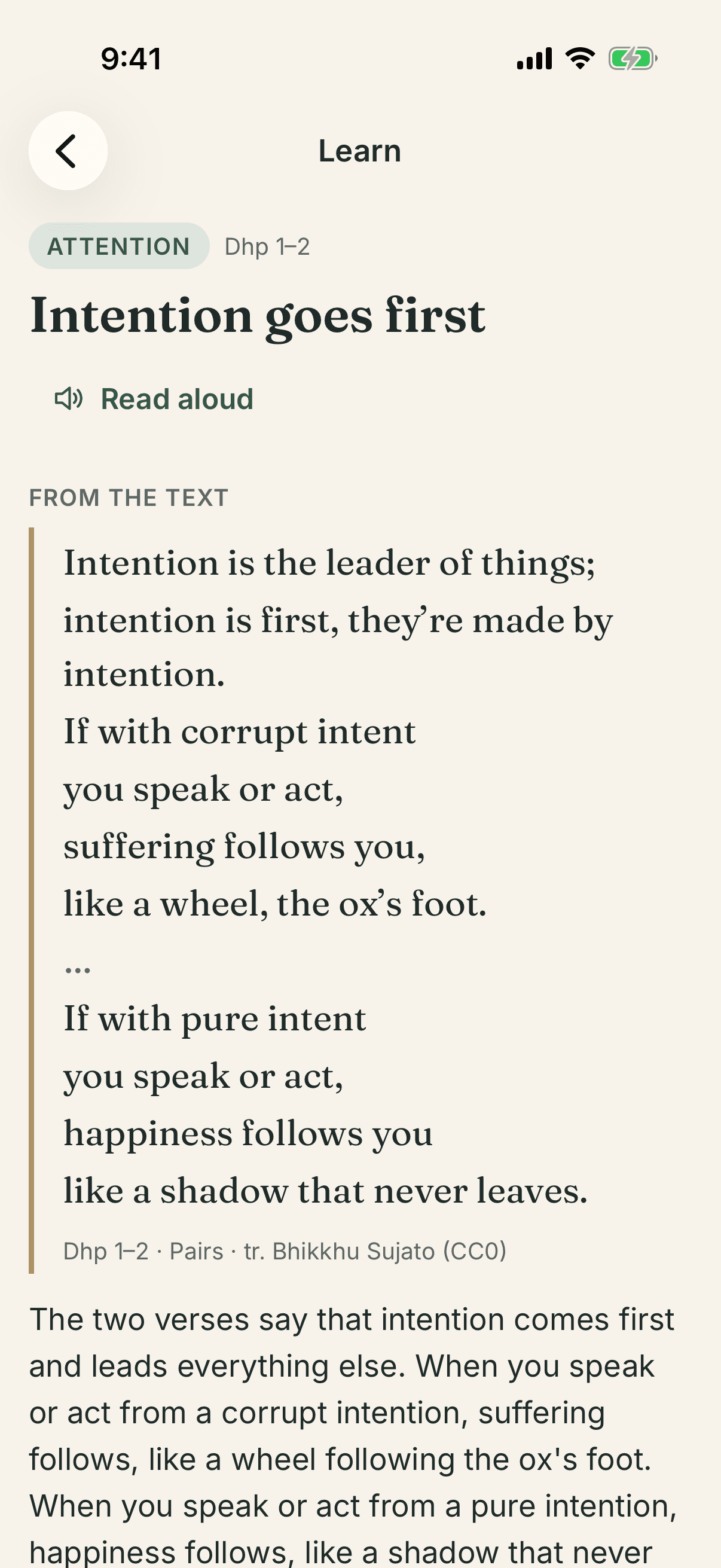 Lesson screen with a Dhammapada excerpt and its explanation